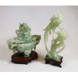 A modern Chinese carved jadeite censer and cover on hardwood stand, together with one other modern