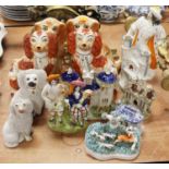 A collection of Staffordshire and Staffordshire style pottery, to include flat back figures,