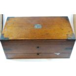 A late Victorian oak and brass bound tool box, the hinged lid with plaque to the underside for '