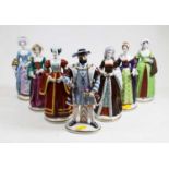 A collection of seven Sitzendorf porcelain figures of Henry VIII and his Six Wives, the largest h.