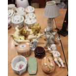 A collection of various ceramics and ornaments, to include a figural porcelain table lamp