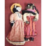 A vintage stuffed anthropomorphic cat, dressed as an Edwardian lady, h.73cm; together with a similar