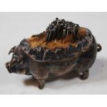 An Edwardian silver novelty pin cushion in the form of a pig, makers mark rubbed but Birmingham,