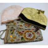 A vintage crewelwork tote bag, decorated with flowers; together with two tea cosies (3)