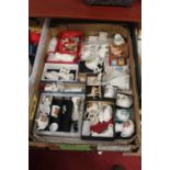 A box of assorted crested cabinet china, together with various Wade and other figures