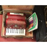 A mid-20th century Pearloid Settimio Soprani accordion, cased; together with a quarter-size students