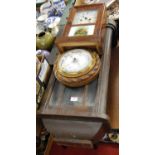 An oak drop trunk wall clock, together with an American walnut and rosewood fronted mantel clock,