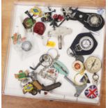 A collection of various motor related keyrings, trinkets, and accessories, to include fan club