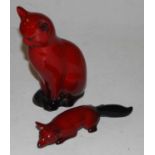 A Royal Doulton flambe figure of a seated cat, having printed lion and circle mark verso, height
