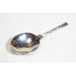 An Arts & Crafts style silver caddy spoon having a hammered bowl and engraved stemCondition