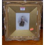 A Victorian portrait photographic print on opaque porcelain, 13 x 10cm, in glazed frame