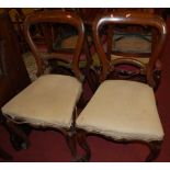 A set of six Victorian rosewood balloon back chairs, together with an Edwardian nursing chair and
