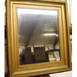 A circa 1900 gilt composition picture frame with later inset mirrorplate, 90 x 78cm