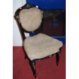 A Victorian ebonised single salon chair (for reupholstery)