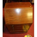 An Edwardian mahogany and chequer strung bureau, width 61cm