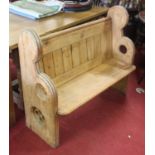 A panelled pine church pew, w.118cmCondition report: The seat has a large repaired section.