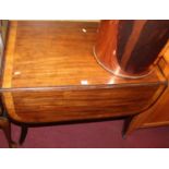 An early 19th century mahogany and satinwood cross banded Pembroke table, having single end drawer