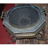 A 19th century Dutch brass octagonal low planter housing removable twin handled tray