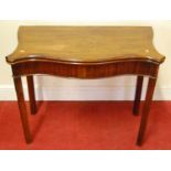 A George III mahogany and rosewood crossbanded serpentine card table having a baize lined playing