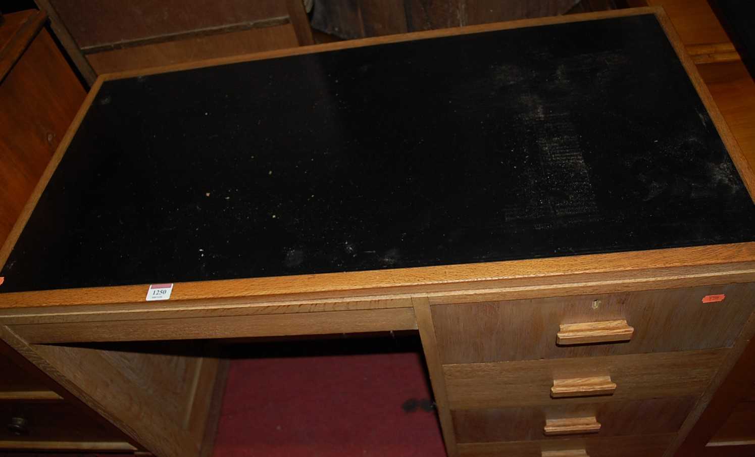 An Art Deco limed oak single pedestal writing desk, having black rexine inset surface, w.101cm; - Image 5 of 8