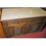A joined oak sideboard, with white marble top, w.126cm