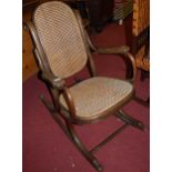 An early 20th century bentwood rocking chair