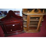 A mahogany hanging corner cupboard, w.46cm, together with a small glazed display cabinet (2)