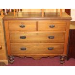 A Victorian faded mahogany chest of two short over two long drawers on turned supports, width 124cm