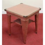 A Lloyd Loom pink painted wicker square table, w.61cm