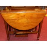 An early 20th century mahogany dropleaf dining table