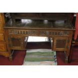 An Old Charm oak writing desk, w.122cm