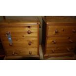 A pair of pine three drawer bedside chests, w.49.5cm