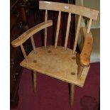 A 19th century provincial rustic elm stickback tub elbow chair, width 63cmCondition report: Good and