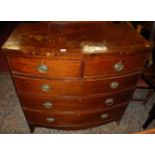 A Victorian mahogany bowfront chest of two short over three long drawers, raised on splayed feet,