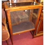 A contemporary joined yew wood freestanding glazed display cabinet (with damage to glazed door), w.