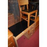 An Art Deco limed oak single pedestal writing desk, having black rexine inset surface, w.101cm;