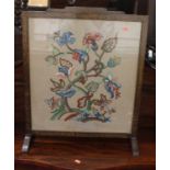 A 1930s tapestry embroidered inset fire screen, w.56.5cm