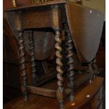 A 1920s oak gateleg dining table, on barley twist supports, 92 x 53cm