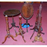A large collection of 19th century and later table parts to include piecrust tops, tripod bases,
