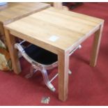 A contemporary hardwood square kitchen table, w.91cm