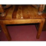 A contemporary hardwood square kitchen table, width 91.5cm