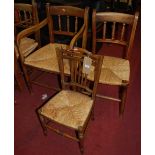 A set of four early 20th century beech spindle back rush seat dining chairs (3+1), together with a