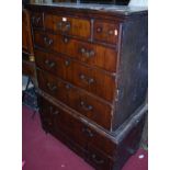 An 18th century figured walnut chest on stand (with damages and later alterations)
