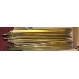 A collection of 20th century brass stair rods, width 66cm