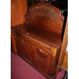 A Victorian mahogany chiffonier with carved decoration standing on a plinth base, w.122cm