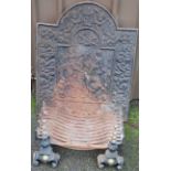 A 19th century cast iron fire grate, dogs and back, H95cm, W75cm