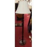 A reproduction mahogany standard lamp, height 170cm