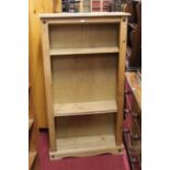 A modern low pine bookshelf, w.83.5cm