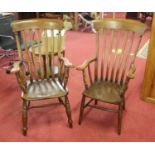 A near pair of elm seat and beech slatback farmhouse armchairs