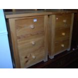 A pair of modern pine three drawer bedside chests, width 46.5cm